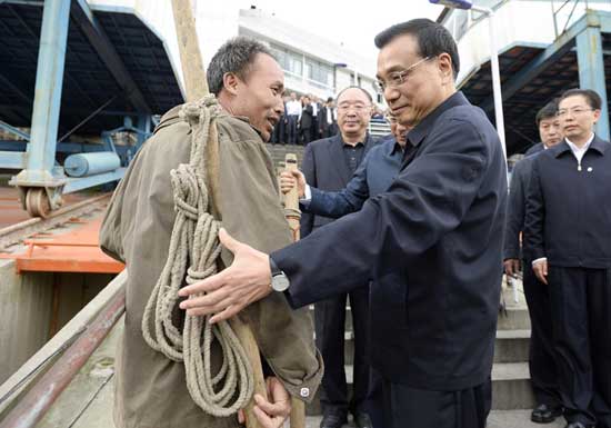 CCTV9英语新闻:李 克强赞重庆棒棒精神 CCTV9英语新闻:李 克强赞重庆棒棒精神