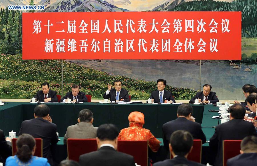 Premier Li stresses development, stability in Xinjiang Premier Li stresses development, stability in Xinjiang