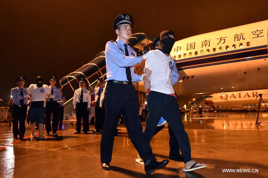 97 fraud suspects extradited from Malaysia to Mainland 97 fraud suspects extradited from Malaysia to Mainland